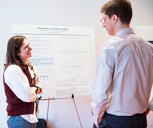 Hannah Farkas presents on the impact of weather volatility on hourly work Hannah Farkas