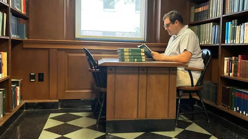 Aaron Freedman working on his dissertation at Columbia’s Butler Library.