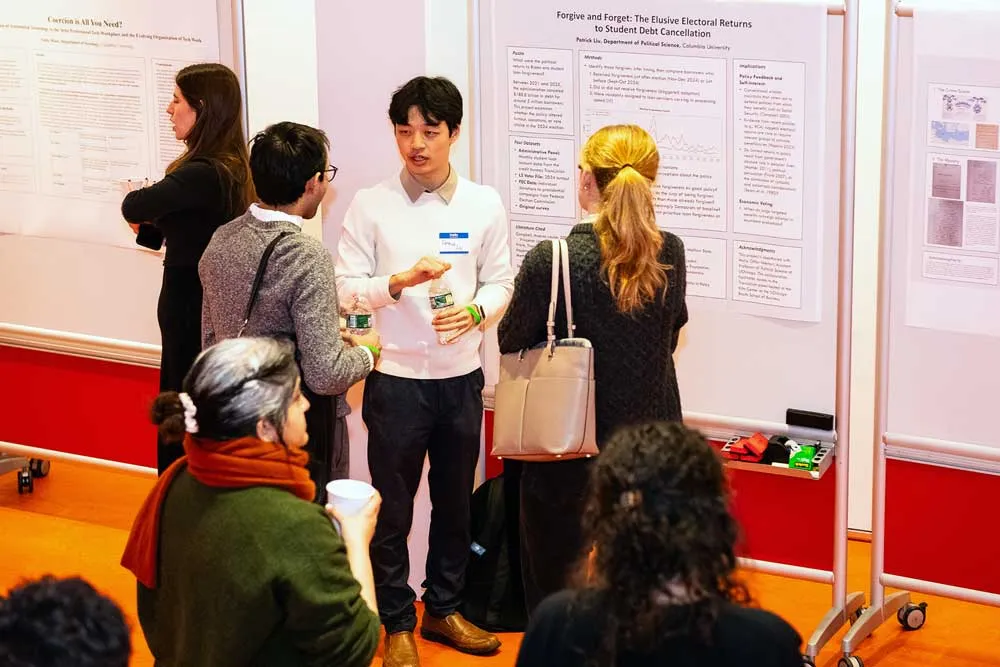 doctoral student grantees presenting during a poster session