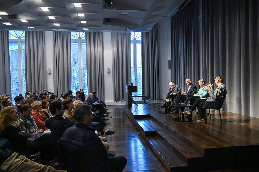 Photo of panelists and the audience